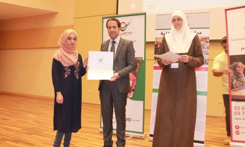 Honoring students participating in scientific activities at AAU in Abu Dhabi