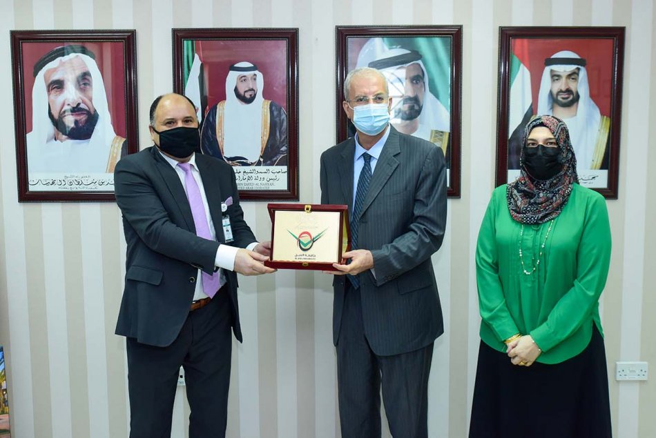 The President honors the distinguished committees at Al Ain University