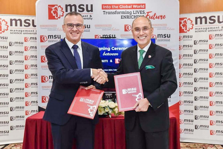اتفاقية تعاون مع جامعة العلوم الإدارية في ماليزيا 